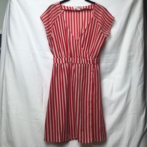 Wrap dress. Two clasps, one on each hip.